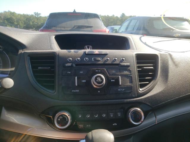 Photo 9 from auction – 2015 HONDA CR-V LX with VIN 2HKRM4H31FH701644