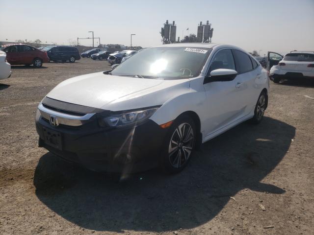 Photo 2 from auction – 2016 HONDA CIVIC EX with VIN 19XFC1F31GE033793