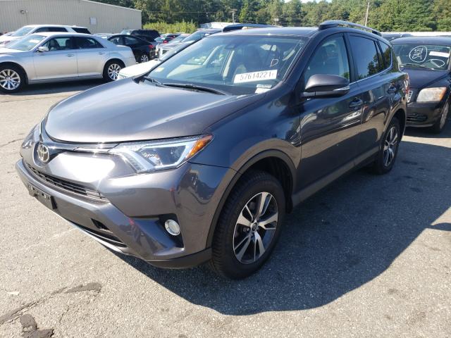 Photo 2 from auction – 2017 TOYOTA RAV4 XLE with VIN JTMRFREV4HJ123465