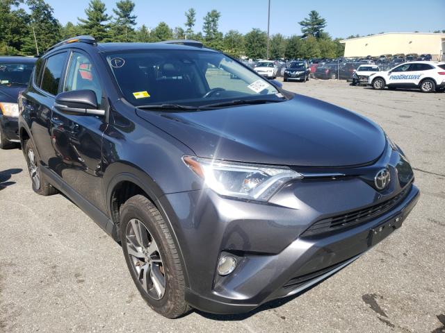 Photo 1 from auction – 2017 TOYOTA RAV4 XLE with VIN JTMRFREV4HJ123465