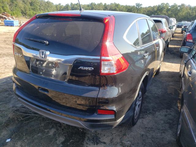 Photo 4 from auction – 2015 HONDA CR-V LX with VIN 2HKRM4H31FH701644
