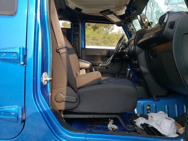 Photo 5 from auction – 2016 JEEP WRANGLER U with VIN 1C4BJWDG5GL174543