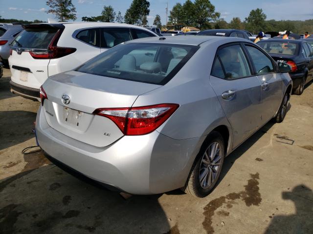 Photo 4 from auction – 2014 TOYOTA COROLLA L with VIN 2T1BURHE0EC069138