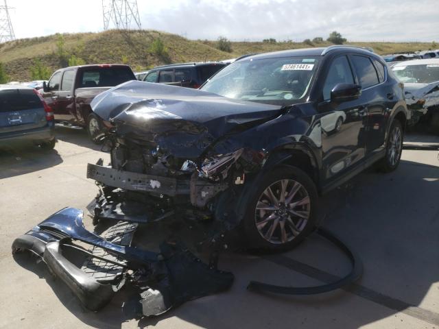 Photo 2 from auction – 2021 MAZDA CX-5 GRAND with VIN JM3KFBAY8M0417306