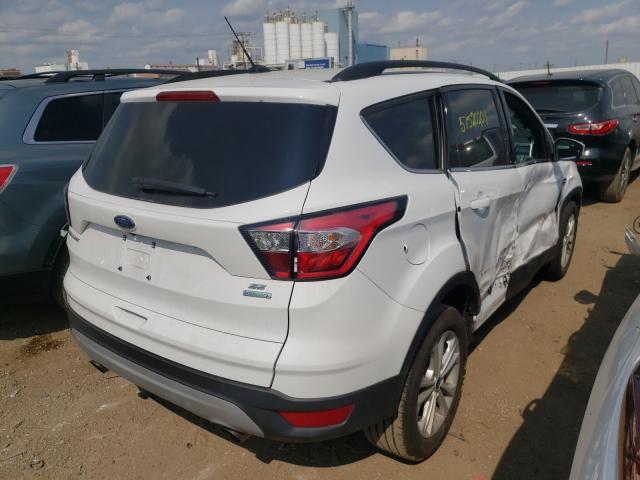 Photo 4 from auction – 2018 FORD ESCAPE SE with VIN 1FMCU0GD3JUA89224