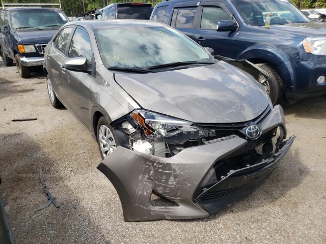 TOYOTA COROLLA L 2018 with VIN 5YFBURHE0JP779666 - Photo from auction