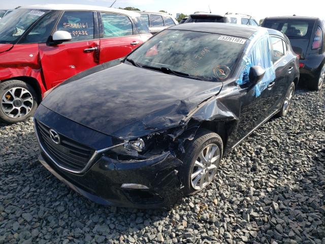 Photo 2 from auction – 2014 MAZDA 3 TOURING with VIN JM1BM1L74E1144938