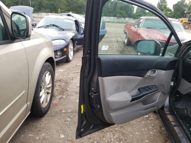 Photo 9 from auction – 2014 HONDA CIVIC LX with VIN 19XFB2F52EE209967