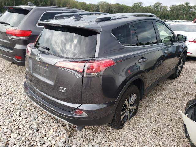 Photo 4 from auction – 2017 TOYOTA RAV4 XLE with VIN JTMRFREV4HJ123465