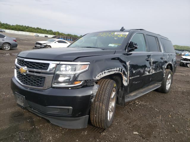 Photo 2 from auction – 2016 CHEVROLET SUBURBAN K with VIN 1GNSKHKC9GR456620
