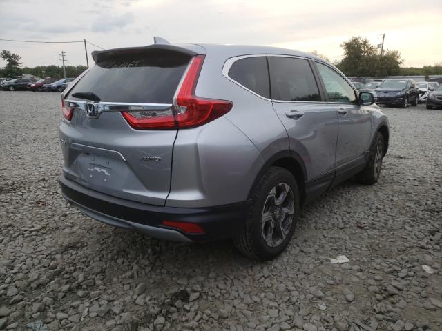 Photo 4 from auction – 2018 HONDA CR-V EX with VIN 7FARW2H55JE056489