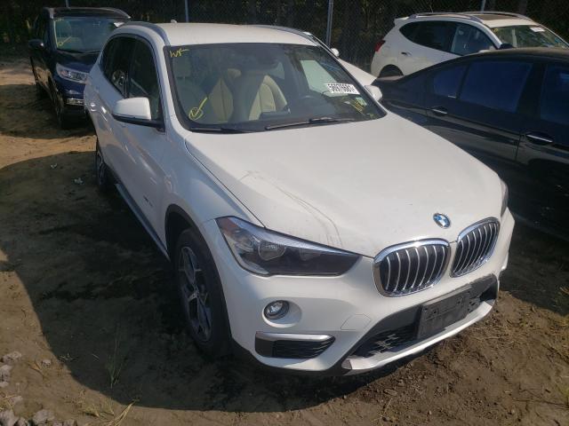 BMW X1 XDRIVE2 2018 with VIN WBXHT3C3XJ5F89618 - Photo from auction