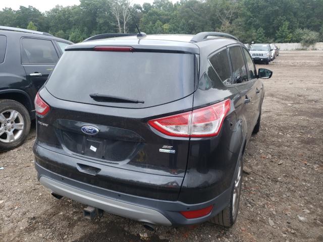 Photo 4 from auction – 2015 FORD ESCAPE SE with VIN 1FMCU9G95FUA02057