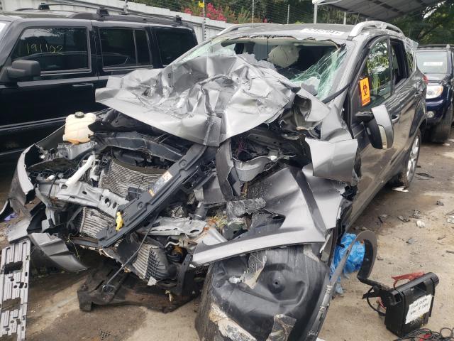 Photo 2 from auction – 2014 FORD ESCAPE TIT with VIN 1FMCU0J9XEUE37918