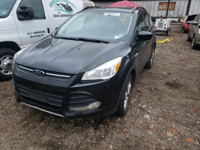 Photo 2 from auction – 2015 FORD ESCAPE SE with VIN 1FMCU9G95FUA02057