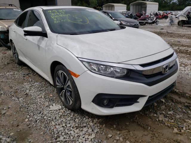HONDA CIVIC EXL 2018 with VIN JHMFC1F77JX034729 - Photo from auction