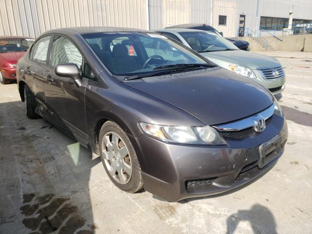 HONDA CIVIC LX 2011 with VIN 2HGFA1F57BH514833 - Photo from auction