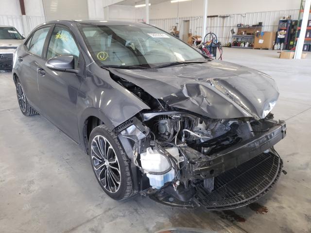 TOYOTA COROLLA L 2014 with VIN 5YFBURHE5EP085867 - Photo from auction