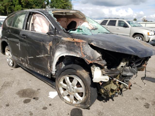 Photo 9 from auction – 2014 HONDA CR-V LX with VIN 2HKRM4H39EH674031
