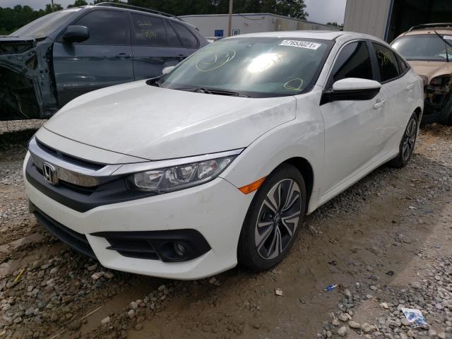 Photo 2 from auction – 2018 HONDA CIVIC EXL with VIN JHMFC1F77JX034729