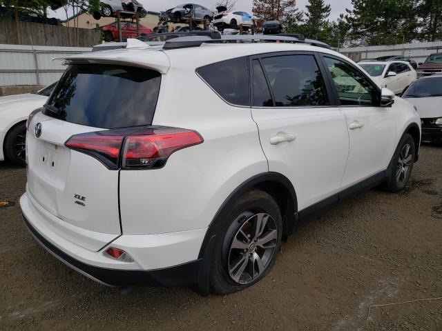 Photo 4 from auction – 2017 TOYOTA RAV4 XLE with VIN JTMRFREV6HJ169752