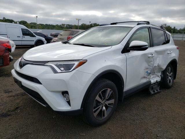 Photo 2 from auction – 2017 TOYOTA RAV4 XLE with VIN JTMRFREV6HJ169752