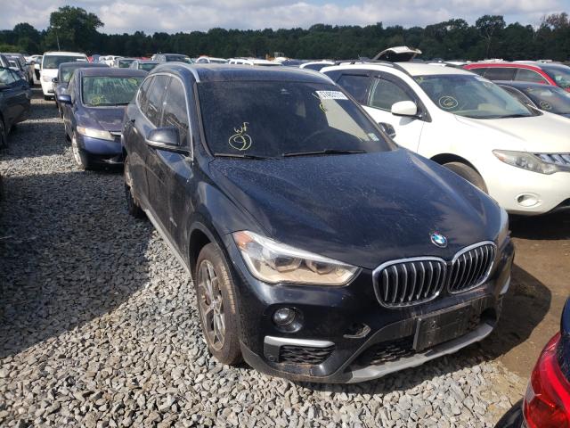 BMW X1 XDRIVE2 2017 with VIN WBXHT3Z3XH4A65036 - Photo from auction