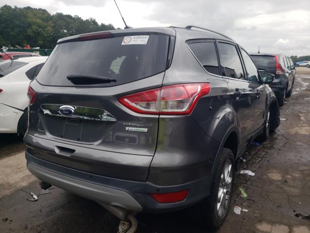 Photo 4 from auction – 2014 FORD ESCAPE TIT with VIN 1FMCU0J9XEUE37918