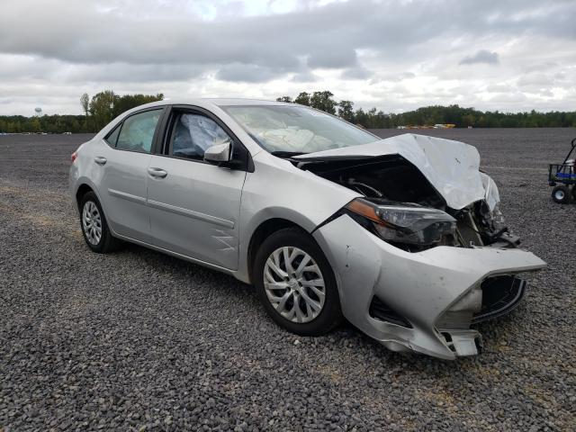 TOYOTA COROLLA L 2018 with VIN 5YFBURHE1JP765095 - Photo from auction