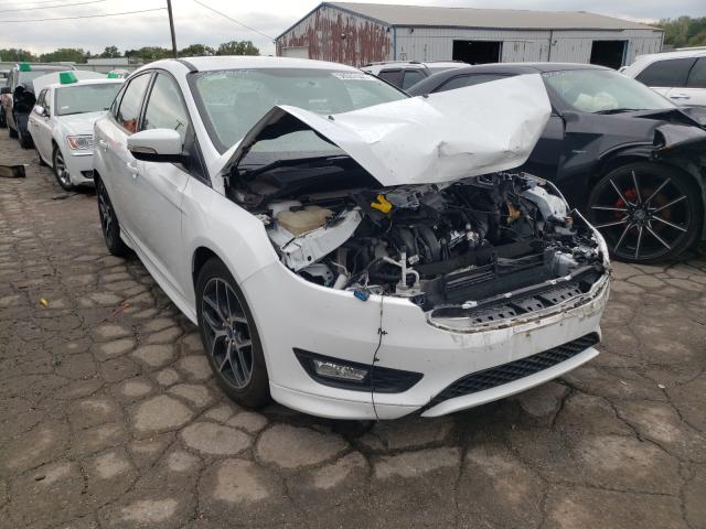 FORD FOCUS SE 2016 with VIN 1FADP3F26GL403194 - Photo from auction