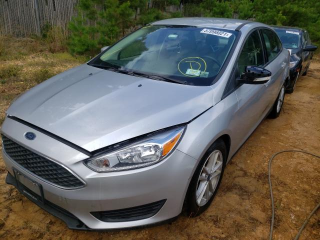 Photo 2 from auction – 2018 FORD FOCUS SE with VIN 1FADP3FE9JL291024