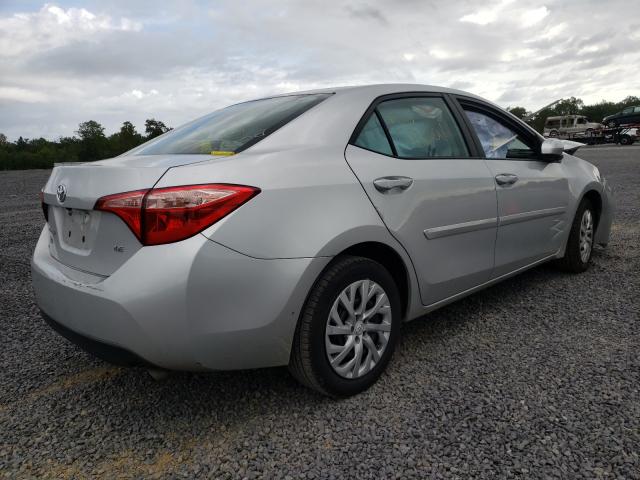 Photo 4 from auction – 2018 TOYOTA COROLLA L with VIN 5YFBURHE1JP765095