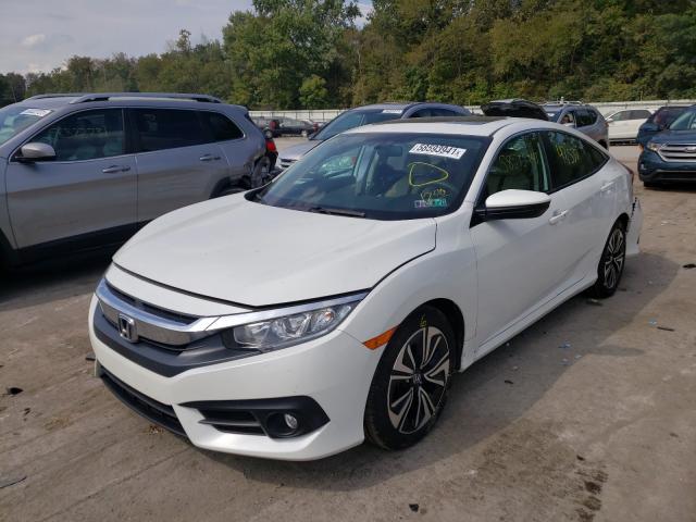 Photo 2 from auction – 2016 HONDA CIVIC EX with VIN 2HGFC1F31GH656840