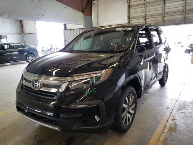 Photo 2 from auction – 2021 HONDA PILOT EXL with VIN 5FNYF6H59MB091099