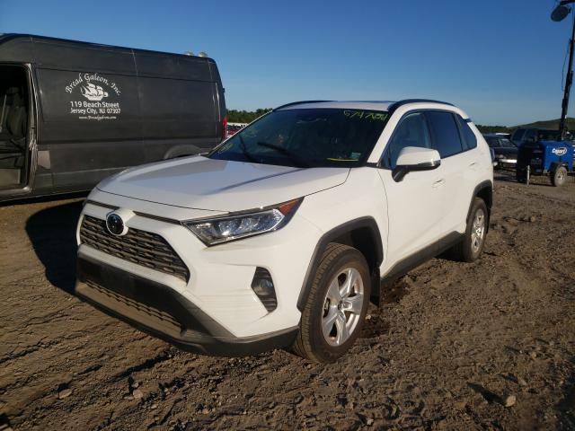Photo 2 from auction – 2019 TOYOTA RAV4 XLE with VIN JTMP1RFV3KD523446