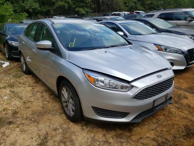 FORD FOCUS SE 2018 with VIN 1FADP3FE9JL291024 - Photo from auction