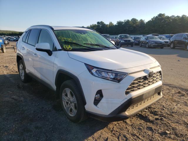 TOYOTA RAV4 XLE 2019 with VIN JTMP1RFV3KD523446 - Photo from auction