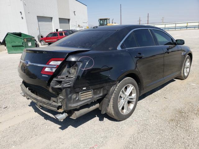 Photo 4 from auction – 2014 FORD TAURUS SEL with VIN 1FAHP2E82EG175783