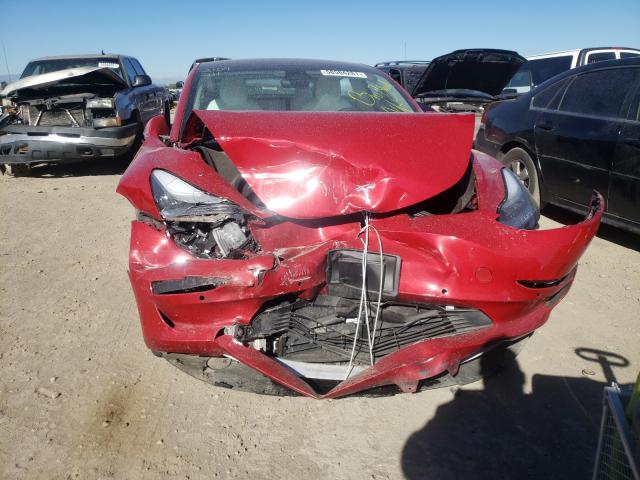 Photo 9 from auction – 2018 TESLA MODEL 3 with VIN 5YJ3E1EB6JF099652