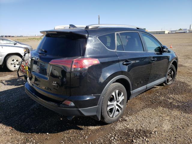 Photo 4 from auction – 2017 TOYOTA RAV4 LE with VIN 2T3BFREV5HW612511
