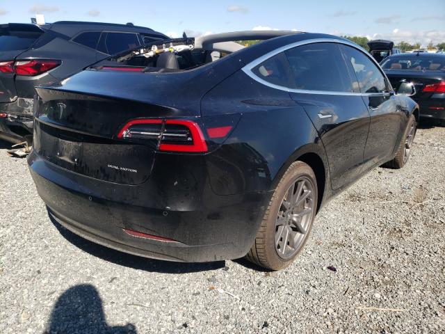 Photo 4 from auction – 2018 TESLA MODEL 3 with VIN 5YJ3E1EB0JF103131