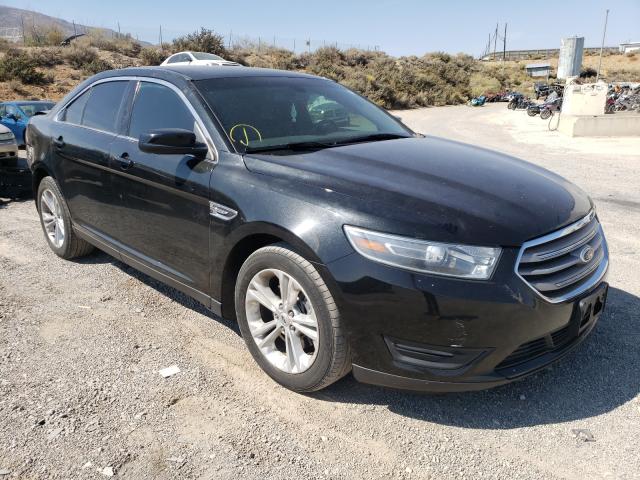 FORD TAURUS SEL 2014 with VIN 1FAHP2E82EG175783 - Photo from auction