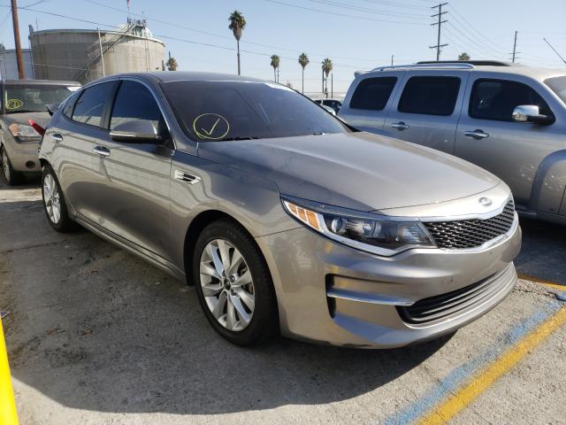 KIA OPTIMA LX 2018 with VIN 5XXGT4L33JG261884 - Photo from auction