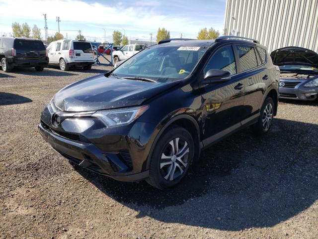 Photo 2 from auction – 2017 TOYOTA RAV4 LE with VIN 2T3BFREV5HW612511