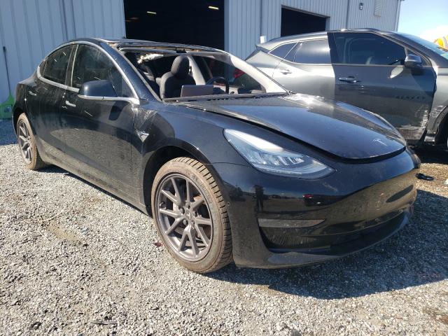 TESLA MODEL 3 2018 with VIN 5YJ3E1EB0JF103131 - Photo from auction