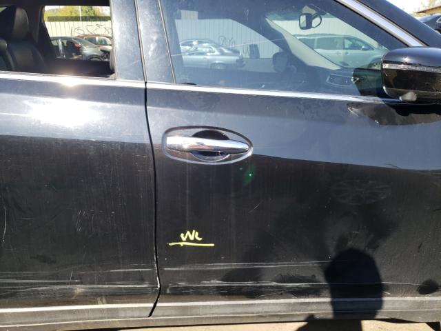 Photo 9 from auction – 2015 NISSAN ROGUE S with VIN 5N1AT2MV1FC841843