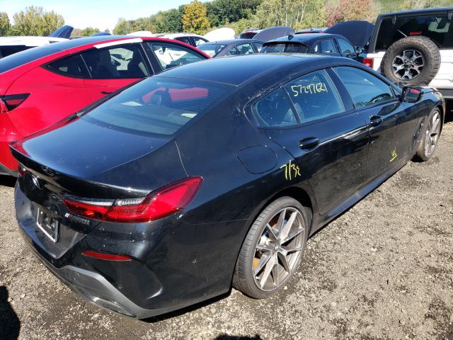 Photo 4 from auction – 2022 BMW M850XI with VIN WBAGV8C03NCG96210