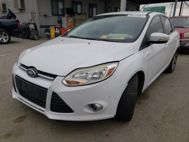 Photo 2 from auction – 2013 FORD FOCUS SE with VIN 1FADP3F25DL244874
