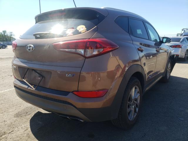 Photo 4 from auction – 2016 HYUNDAI TUCSON LIM with VIN KM8J33A21GU135483