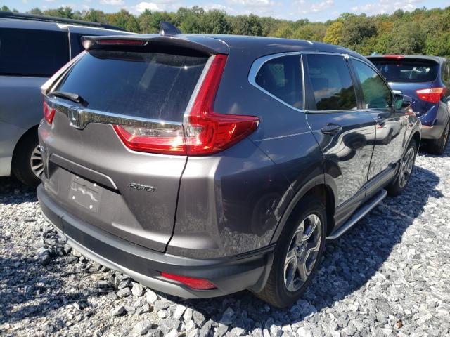 Photo 4 from auction – 2018 HONDA CR-V EXL with VIN 2HKRW2H80JH645201
